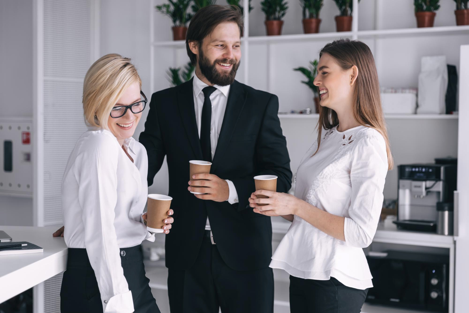 coffee break group attractive business people standing side by side holding cups smiling while standing office